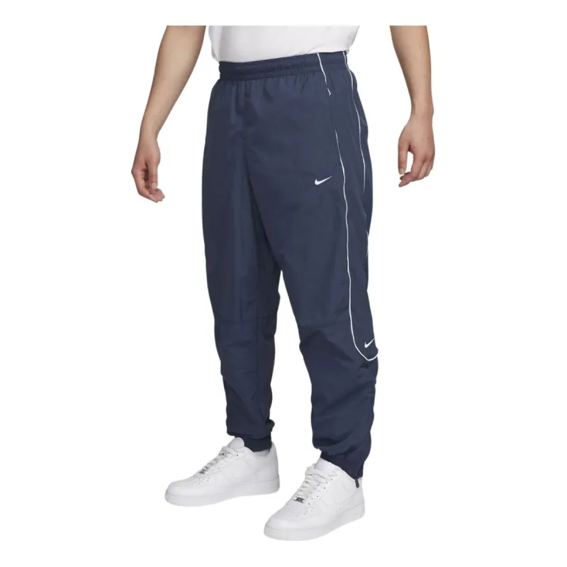 Nike Solo Swoosh Knit Zippered Pants 'Thunder Blue' FB8621-437 sold by KicksCrew