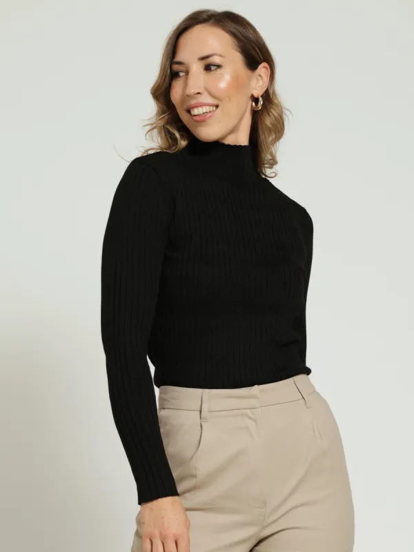 Ribbed Turtleneck With Diamond Design - Black sold by Edgars
