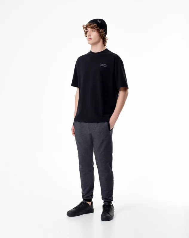 Jogger tiro medio negro jaspe sold by Gef