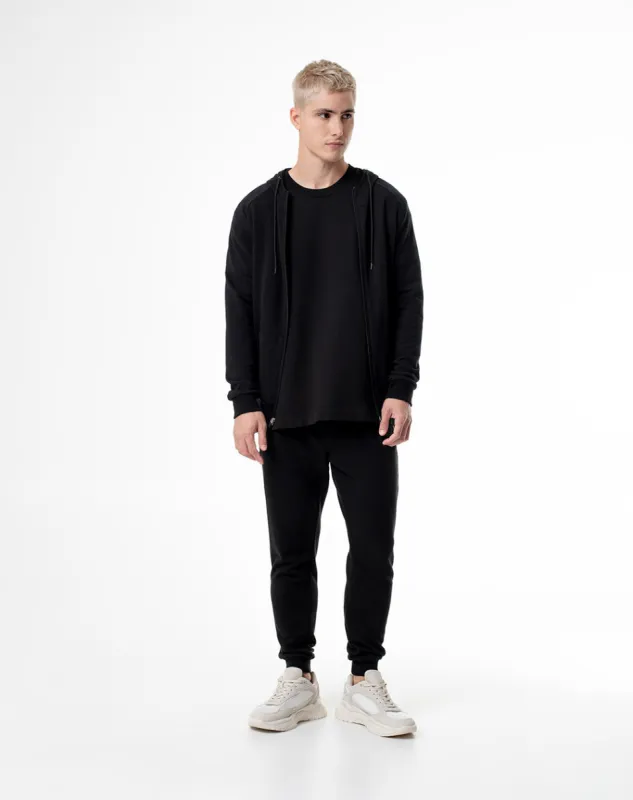 Jogger relaxed fit tiro medio negro sold by Gef