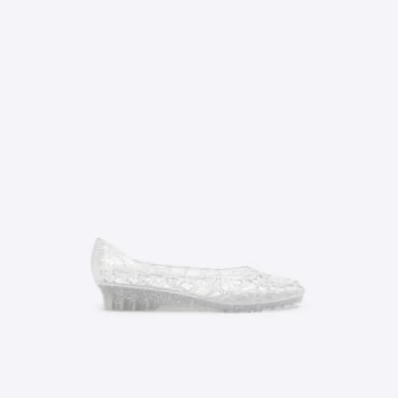 Silver metallic jelly ballet pumps sold by River Island