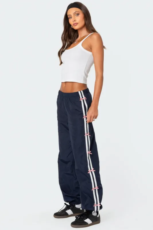 Bow Stripe Nylon Track Pants sold by Edikted