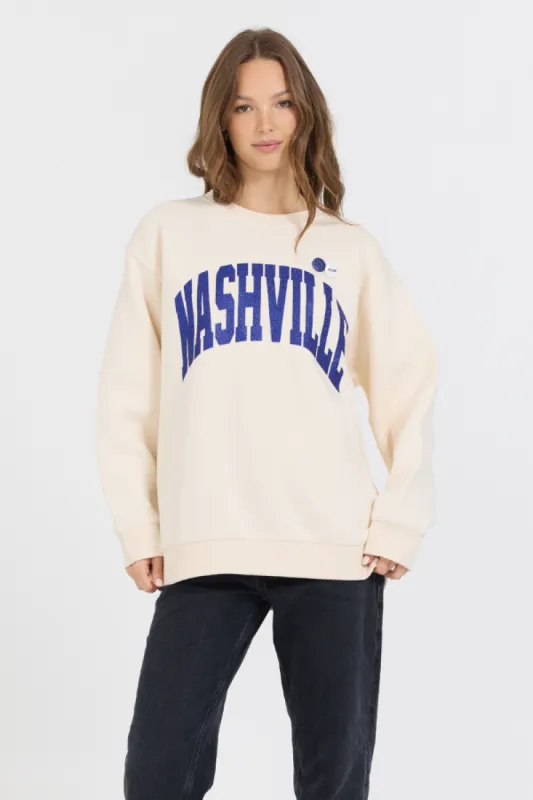 Cream W/ Royal Blue Garment Dye Fleece Crew W/ Glitter Print sold by Vintage Havana