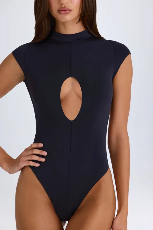 Cut-Out Bodysuit in Black sold by Oh Polly