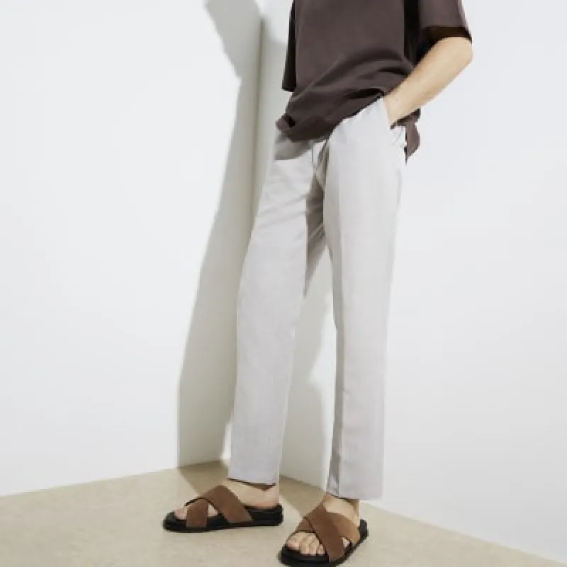Brown suede cross over sandals sold by River Island