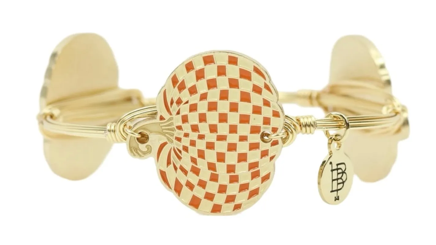 The Checkered Pumpkin Bangle Bracelet sold by Bourbon and Bowties
