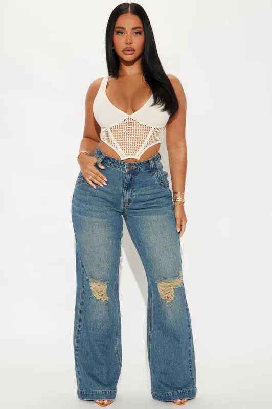 How It Goes Ripped Wide Leg Jeans - Vintage Wash sold by Fashion Nova