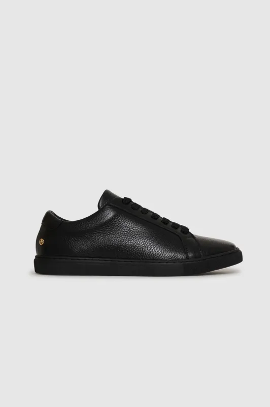 Liane Sneakers - Black Pebbled sold by Anine Bing