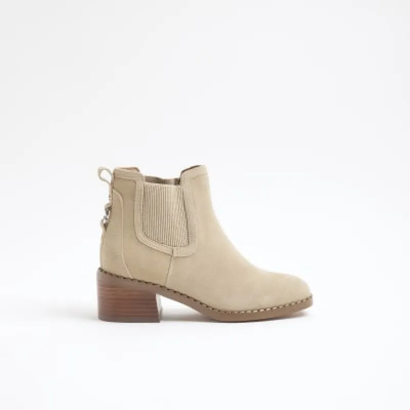 Beige suede block heeled ankle boots sold by River Island