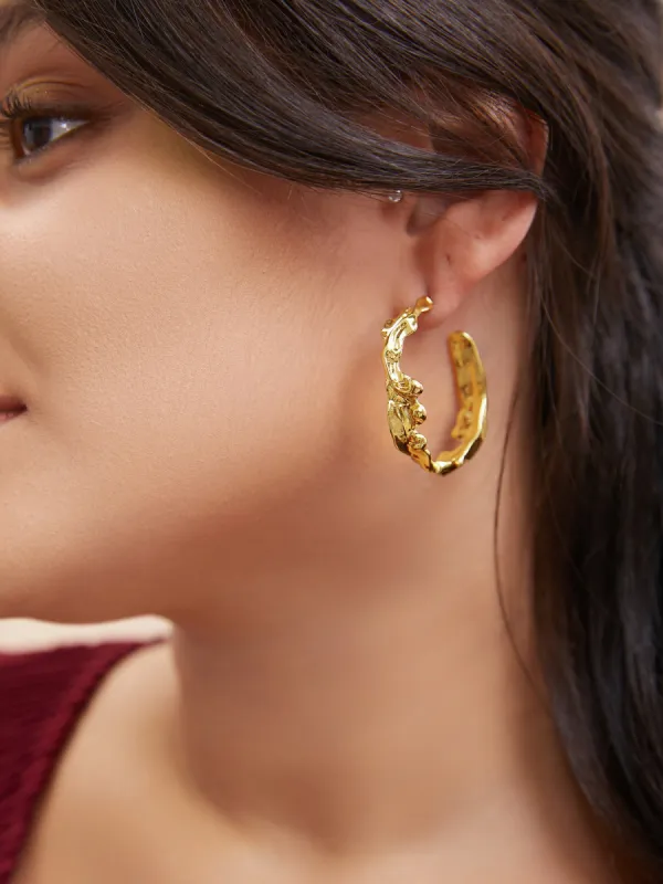 Asymmetrical Metallic Textured Hoop Earrings sold by Bloomchic