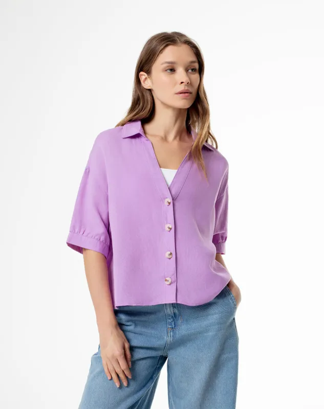 Camisa relaxed fit manga corta violeta sold by Gef
