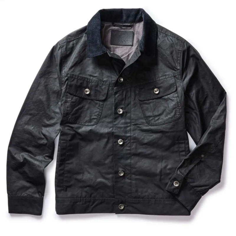 The Long Haul Jacket in Coal Waxed Canvas sold by Taylor Stitch