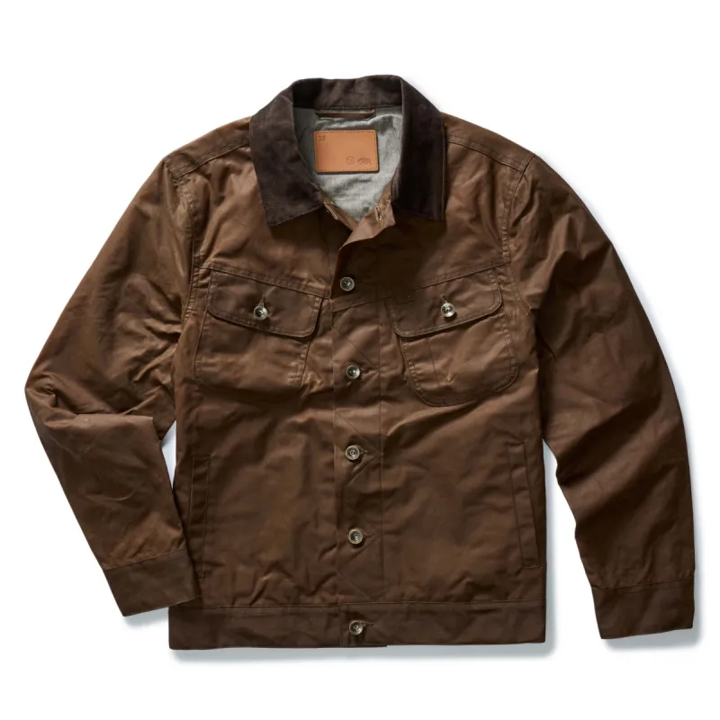 The Long Haul Jacket in Dark Khaki Waxed Canvas sold by Taylor Stitch