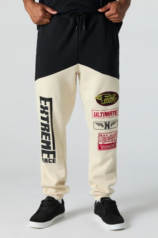 Racing Embroidered Fleece Jogger sold by Urban Planet