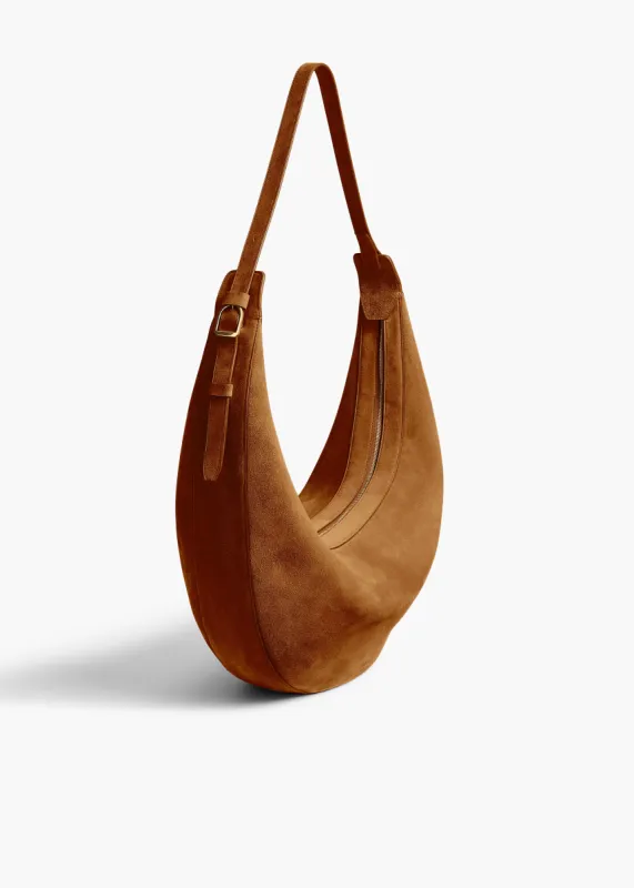 Augustina Hobo in Mud Suede sold by KHAITE