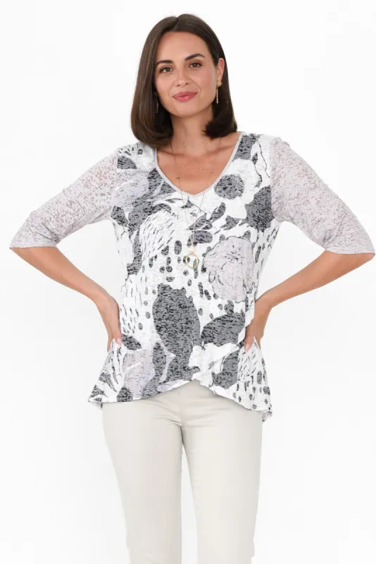Skyros White Floral 3/4 Sleeve Top sold by Blue Bungalow