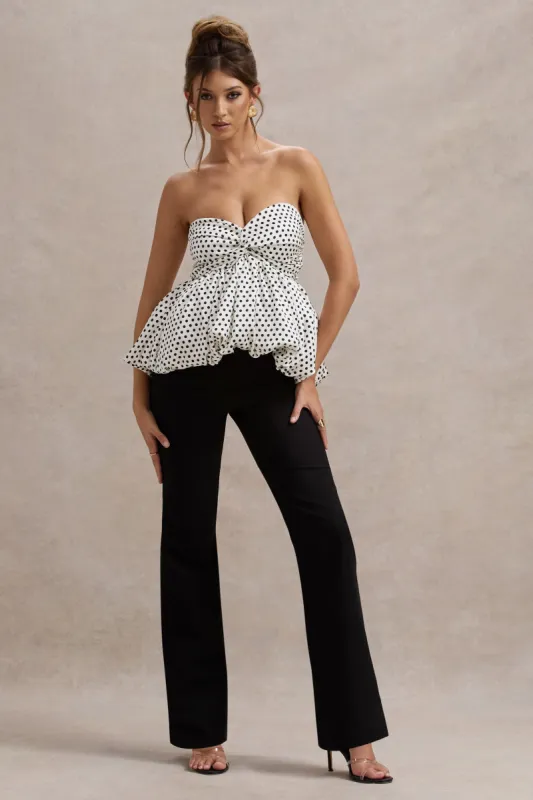 Divina | White & Black Polka Dot Strapless Ruffled Jumpsuit sold by Club L London