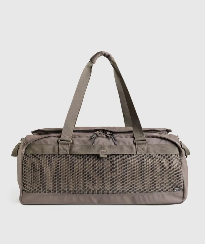 Gymshark Pursuit Duffle Bag - Camo Brown/ Cement Brown sold by Gymshark