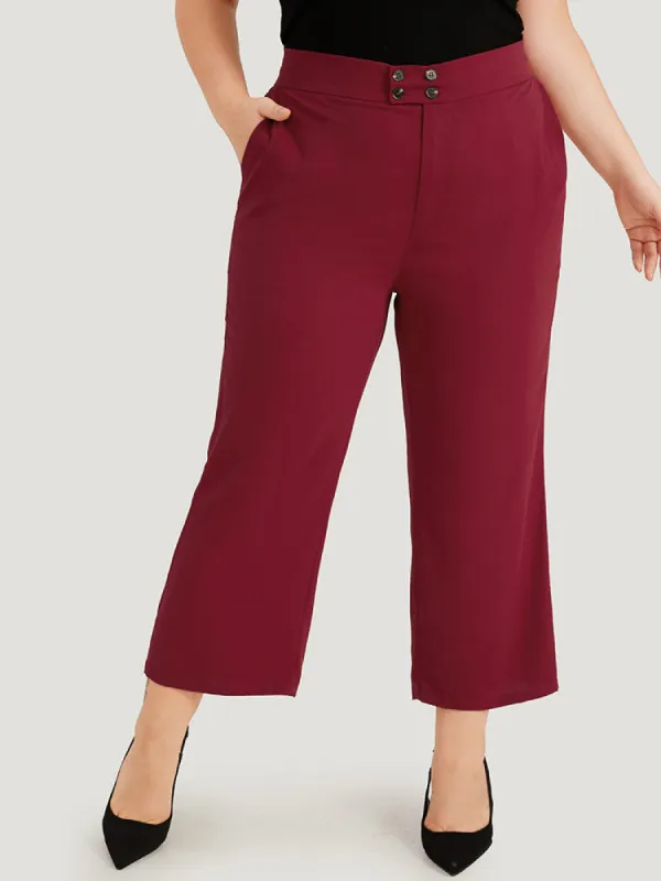 Solid Button Detail Slant Pocket High Rise Pants sold by Bloomchic