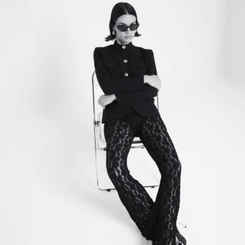 Black Lace Flares Trousers sold by River Island