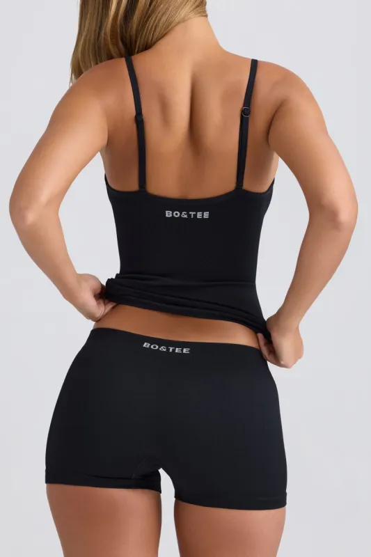 Super Sculpt Seamless Mid-Rise Mini Shorts in Black sold by Bo + Tee