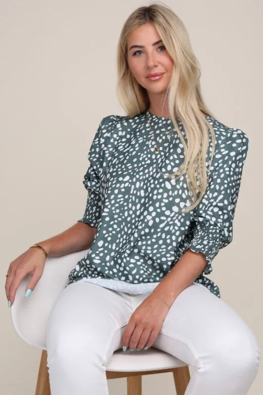 Puff Sleeve Top sold by Charming Charlie