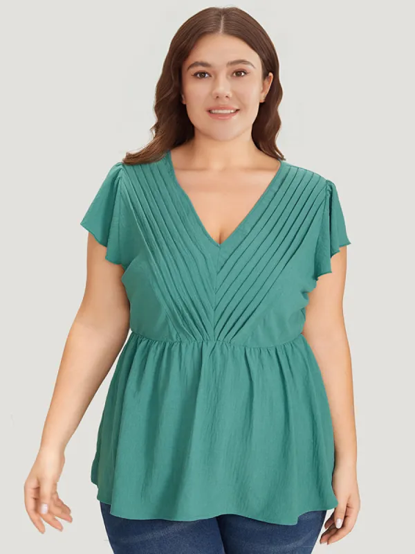 Solid Pleated Flutter Cap Sleeve Blouse sold by Bloomchic