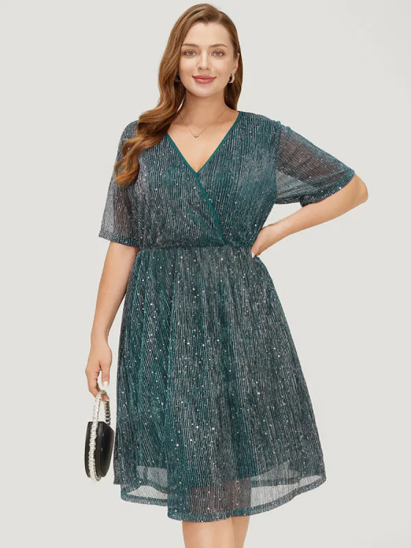 Glitter Mesh Flutter Sleeve Pocket Wrap Dress sold by Bloomchic