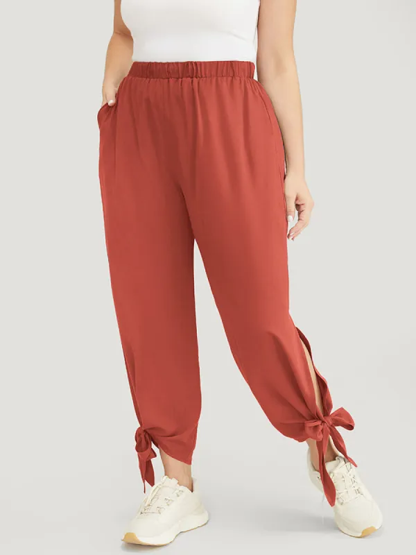 Solid Knotted Split Hem Pocket Pants sold by Bloomchic