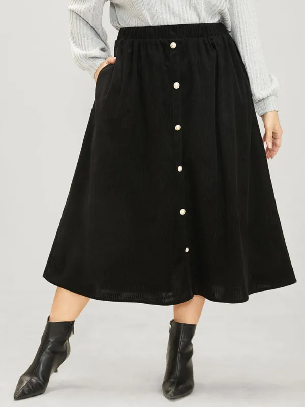 Solid Button Detail Pocket Elastic Waist Corduroy Skirt sold by Bloomchic