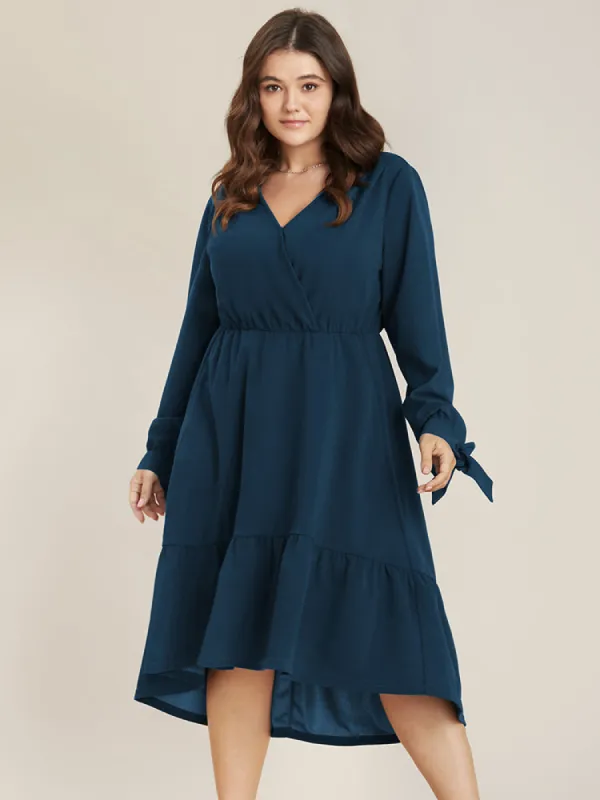 Solid Knotted Sleeve Pocket Wrap Ruffle Asymmetrical Hem Dress sold by Bloomchic