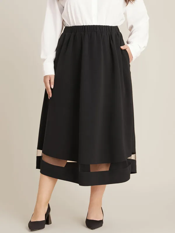 Solid Mesh Patchwork Pocket Elastic Waist Skirt sold by Bloomchic
