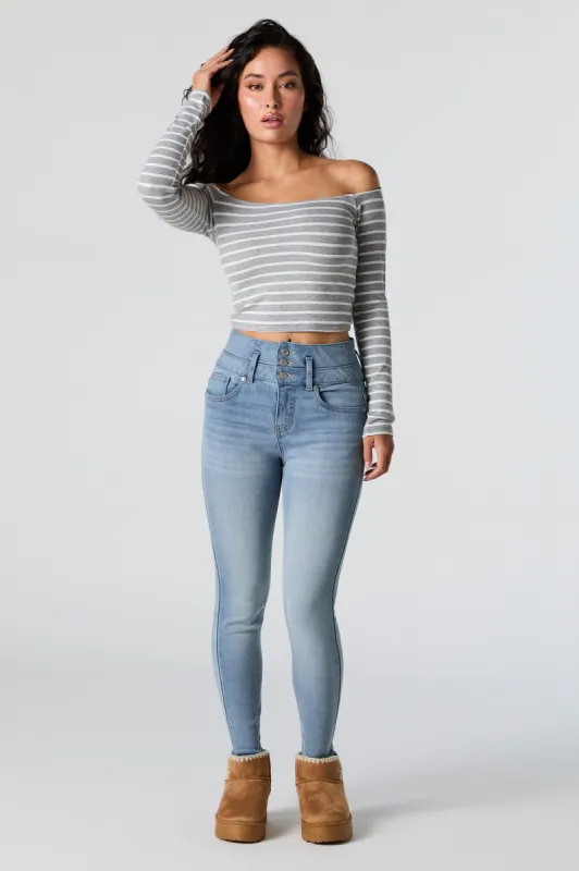 Jean ajusté délavé moyen à taille empilée sold by Urban Planet
