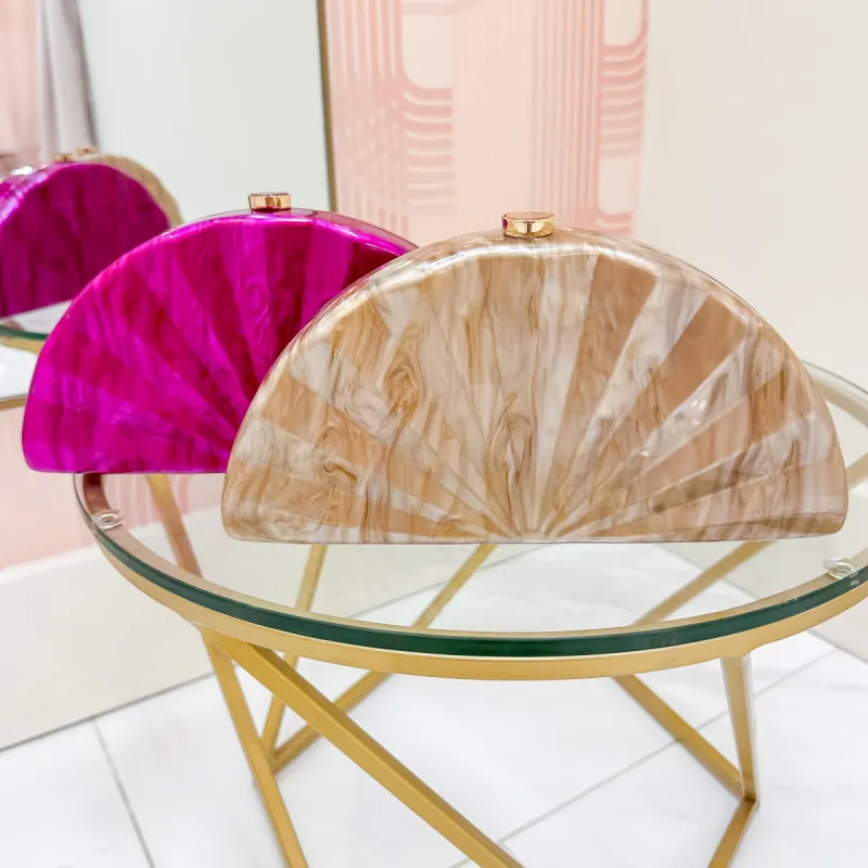 Pearlized Semicircle Acrylic Clutch sold by Mimosa