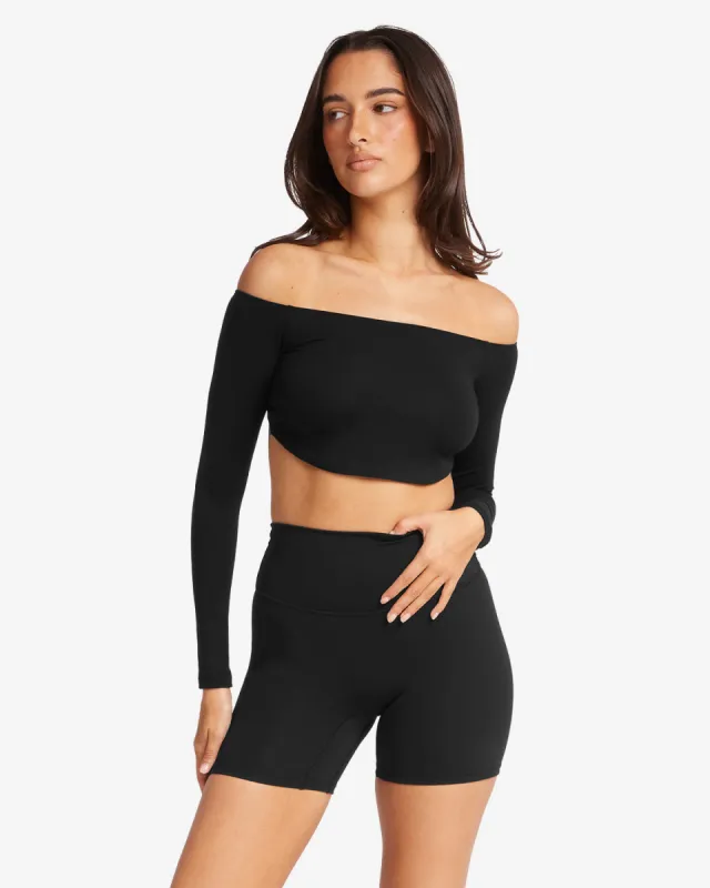 Open Back Long Sleeve Top | Black sold by Crop Shop Boutique