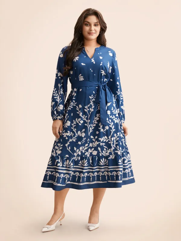 Notched Boho Print Belted Midi Dress sold by Bloomchic
