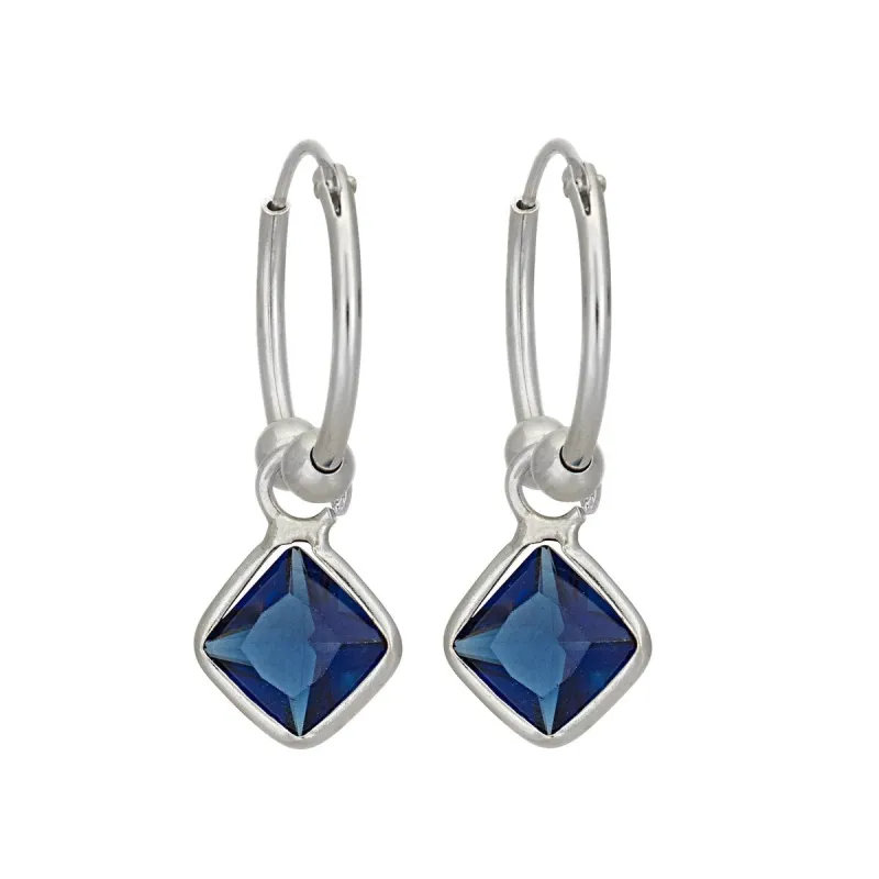 Sterling Silver Sapphire Cubic Zirconia Huggie Hoop Earrings sold by Zulily