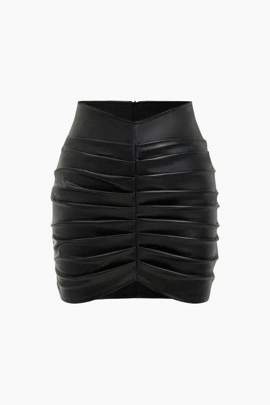 Ruched nederdel i solidt imiteret læder sold by Micas