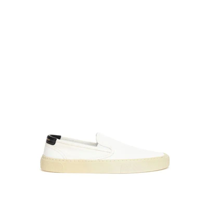 White Cotton Sneaker sold by Louxly