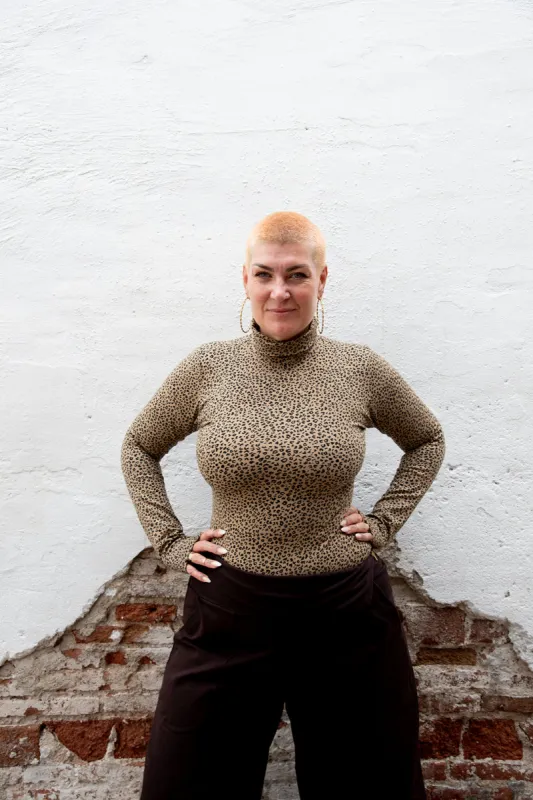 Turtle Neck Long Sleeve Full Length Top with Hole in Classic Leopard sold by Manners London