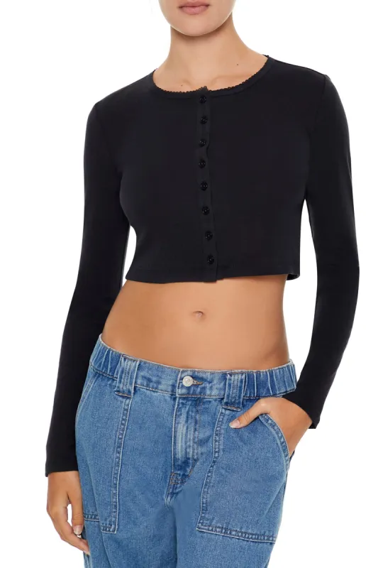 Cardigan court en tricot de pointelle sold by Urban Planet