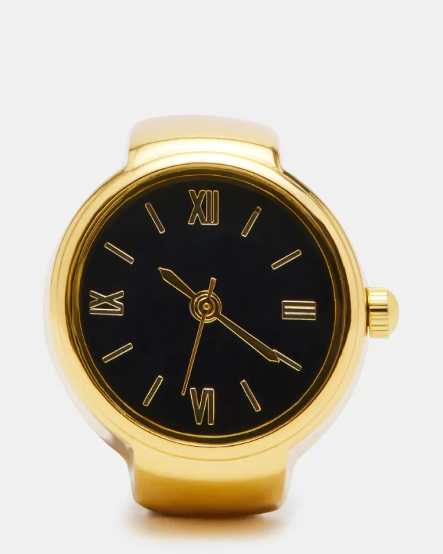 WATCH RING BLACK/GOLD sold by Steve Madden