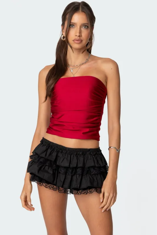 Maxeen Shiny Gathered Tube Top sold by Edikted