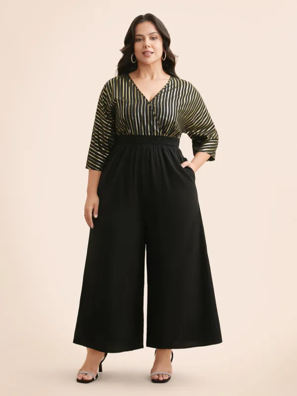 Glitter Striped Patchwork Shirred Jumpsuit sold by Bloomchic