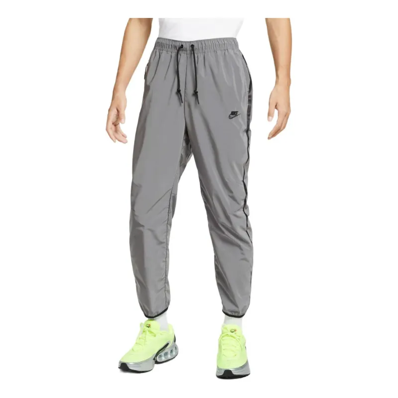 Nike Tech Woven Flash Pants Asia Sizing 'Reflect Silver Black' FZ7588-035 sold by KicksCrew