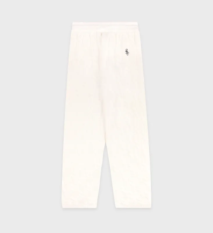 SRC Cableknit Cashmere Trousers - Cream/Navy sold by Sporty and Rich