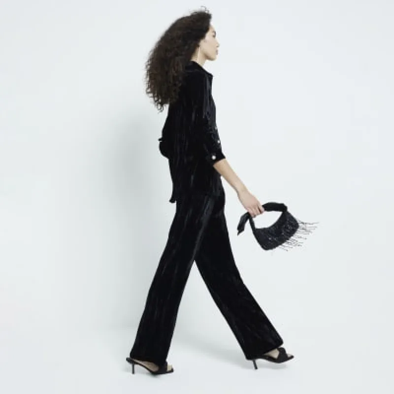 Black Velvet Wide Leg Trousers sold by River Island
