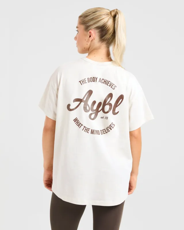 Body Achieve Mind Believe Oversized T Shirt - Beige sold by AYBL