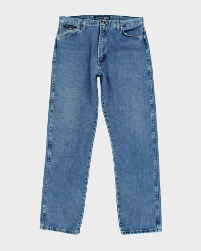Vintage Wrangler Light Wash Relaxed Jeans - W34 L32 sold by Rokit