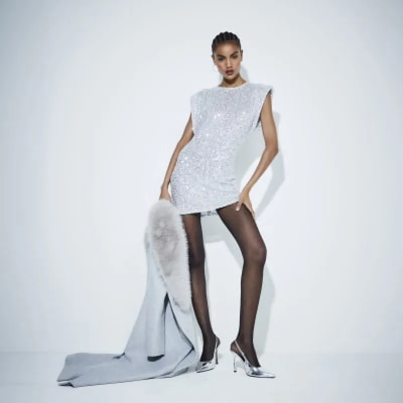 White Sequin Shoulder Pad Mini Bodycon Dress sold by River Island
